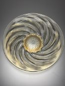 A Renee Lalique (1860-1945), Poissons opalescent moulded glass dish: h. x 5cm d. x 30cm
