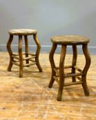A pair of Chinese rootwood circular top stools on shaped wave supports with cross stretchers (h.45cm