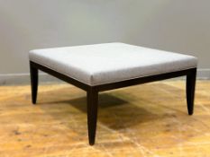 A dark stained oak square centre stool upholstered in a smart grey/brown linen, on slim tapered