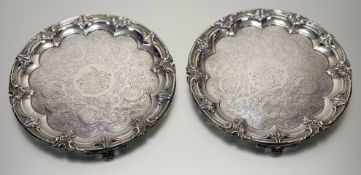 A handsome pair of George IV Rococo Revival engraved silver salvers, S.C. Younge & Co., Sheffield