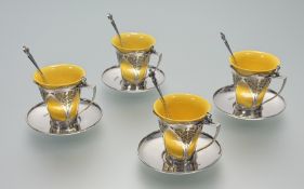 A striking cased Edwardian silver-mounted Royal Doulton coffee service for four, Roberts & Belk,