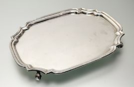A George V silver salver, Goldsmiths & Silversmiths Company, London, 1934, of shaped rectangular
