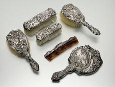 A silver dressing table set in the Art Nouveau taste, import marks for George Edward & Sons, Glasgow