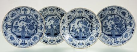 A set of four Dutch Delft plates, late 18th century, decorated in blue and white in the