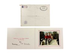 T.R.H. The Prince and Princess of Wales, signed 1990 Christmas card with twin gilt Royal cyphers to