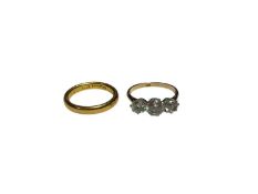 22ct gold wedding ring and a 9ct gold synthetic white three stone ring (2)