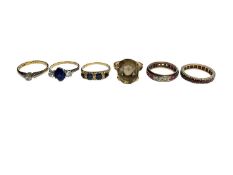 Six yellow metal and gem set dress rings