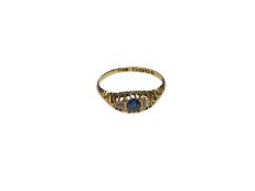 Edwardian 18ct gold sapphire and diamond threee stone ring with a circular mixed cut blue sapphire f