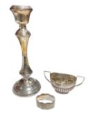 Silver candlestick, silver two handled suagr bowl and a silver napkin ring (3)