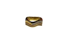18ct gold diamond set ring with a four band wavy design