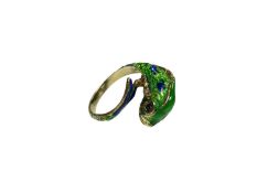 Yellow metal and enamel ring in the form of a fish,