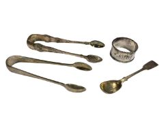 Pair of Georgian silver sugar tongs, one other silver pair, Victorian silver spoon and a silver napk