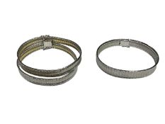 Continental white metal two strand articulated bracelet, 19cm long and another similar bracelet, 18.