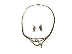 Gold and diamond three stone necklace, together with a pair of similar style earrings