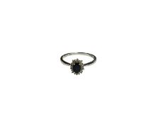 Sapphire and diamond cluster ring on 9ct white gold shank