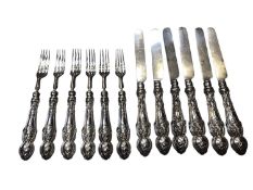 Set of twelve Victorian silver dessert knives and forks with grape vine decoration to the handles (S