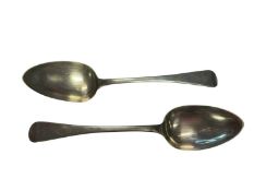 Pair of Georgian silver serving spoons with engraved bird crest (London 1819)
