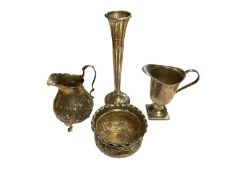 Victorian silver sugar bowl and milk jug, both with embossed floral scroll decoration, silver spill