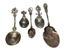 Four Dutch silver caddy/other spoons and a sterling silver serving spoon (5)