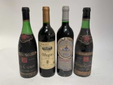 Four bottles, Torres Gran Coronas Reserva 1970 and 1975, Evo Guelbenzu 1994, Muga Rioja 1994