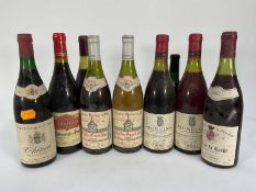 Nine bottles of wine including: Chablis Grand Cru 1988, Musigny 1986, Clos de L'Oratoire des Papes 2