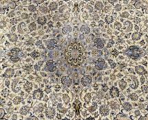 VINTAGE WOOLEN RUG with cream ground and floral pattern throughout, 385 x 275cms Provenance: private