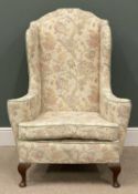HIGH WING BACK ARMCHAIR with floral upholstery, 121 (h) x 89 (w) x 56cms (d) Provenance: private
