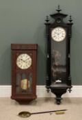 TWO WALL CLOCKS, comprising ebonised Vienna wall clock, 128 (h) x 37 (w) x 16cms (d) with single