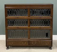 LIBRARY BOOKCASE having three stacks with leaded glass and letter-box doors over two base drawers,