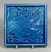 J. C. EDWARDS RUABON TURQUOISE GLAZED TILE / TEAPOT STAND, designed by C. F. A. Voysey, decorated