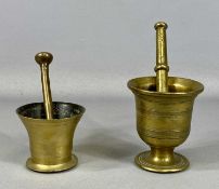 TWO BRONZE PESTLES & MORTARS, 13cms (h) the tallest mortar Provenance: private collection