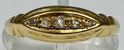 18CT GOLD RING, set with band of five small diamonds, size M, 2gms Provenance: private collection