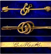 THREE 9CT GOLD BROOCHES, knot bar brooch, bar brooch monogram 'CMA', and knot brooch set with stone,