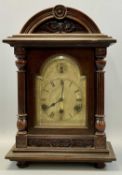 EDWARDIAN BEECH CASED DOME TOP MANTEL CLOCK, arched silvered dial with black Roman numerals and