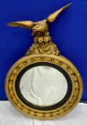 REGENCY STYLE CIRCULAR GILT FRAMED CONVEX WALL MIRROR, with a ball border and surmounted by an eagle