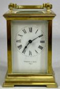 VICTORIAN GILDED BRASS CASED FOUR GLASS CARRIAGE CLOCK, white enamel dial with Roman numerals marked
