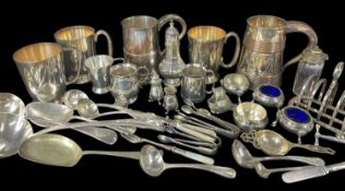 ASSORTED E.P.N.S TABLEWARES, including tankards, salts, nut crackers, asparagus servers, ladles,