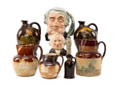 ASSORTED DOULTON COLLECTABLES, comprising two Royal Doulton Dewar's whisky Kingsware flasks, two