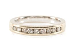 18CT. WHITE GOLD NINE STONE DIAMOND HALF ETERNITY RING, 3grams total weight, size I/J Provenance: