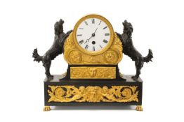 REGENCY BRONZE & ORMOLU MANTEL CLOCK, white enamel dial with Roman numerals, set within a drum