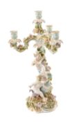 SITZENDORF PORCELAIN FIGURAL 4-LIGHT CANDELABRUM, floral encrusted arms and base, central column