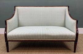 EDWARDIAN MAHOGANY TWO SEATER SETTEE, foliate carving to lower frame, upholstered in pale blue