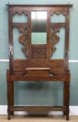 ANTIQUE CARVED OAK HALL STAND, central mirrored panel flanked by Ho-ho style bird carvings, eight