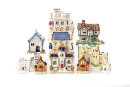 ASSORTED STAFFORDSHIRE POTTERY CASTLES, COTTAGES AND PASTILLE BURNERS including, early 20th c.