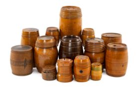 COLLECTION OF TREEN 'BARREL' BOXES, screw top, some slotted for coins, in boxwood, laburnum etc. (