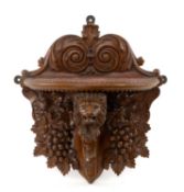 VICTORIAN WALNUT WALL BRACKET, carved with a lion, 40cms Provenance: private collection Vale of
