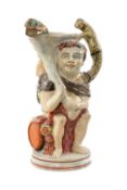 EARLY 19TH C. PEARLWARE BACCHUS & SATYR TOBY JUG, modelled with Bacchus seated on a barrel laden