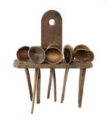 VINTAGE SPOON RACK & NINE CAWL SPOONS, probably sycamore Provenance: private collection Rhondda