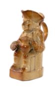 EARLY 19TH C. SALT GLAZED STONEWARE TOBY JUG, probably Brampton, seated wearing tricorn hat and