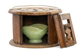TREEN CARRIAGE FOOT WARMER, brass handled with pierced sliding door, with green glazed pottery